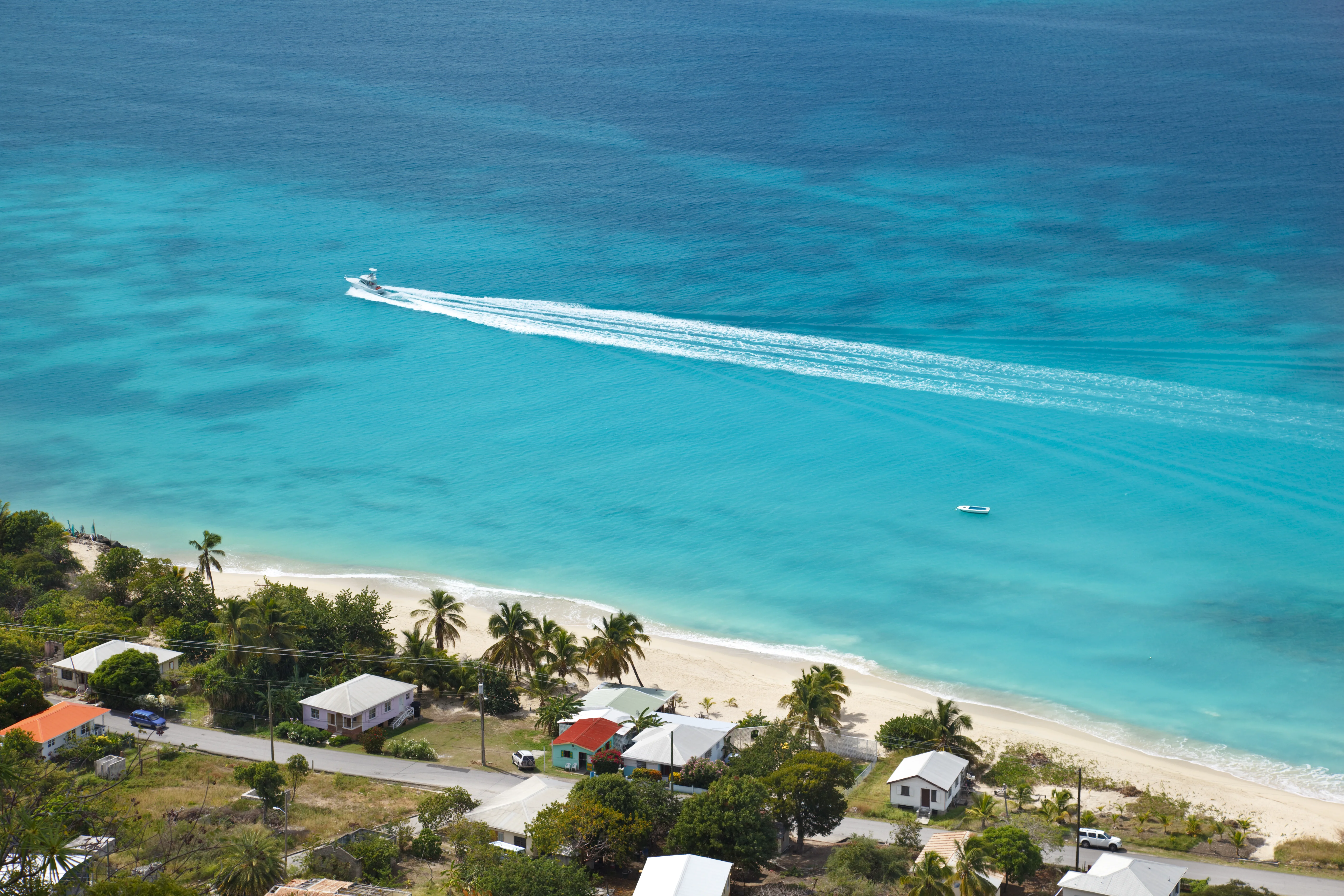 Antigua powerboat passing close to the coast