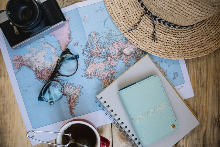 Passport travel documents and essentials organized for a Caribbean vacation